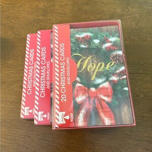 Three identical setsof unopened vintage Christmas cards.Nonreligious, 4 by 5 in